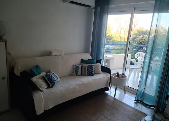 T2 climatisé à 5 minutes à pied de la plage avec parking, piscine et wifi